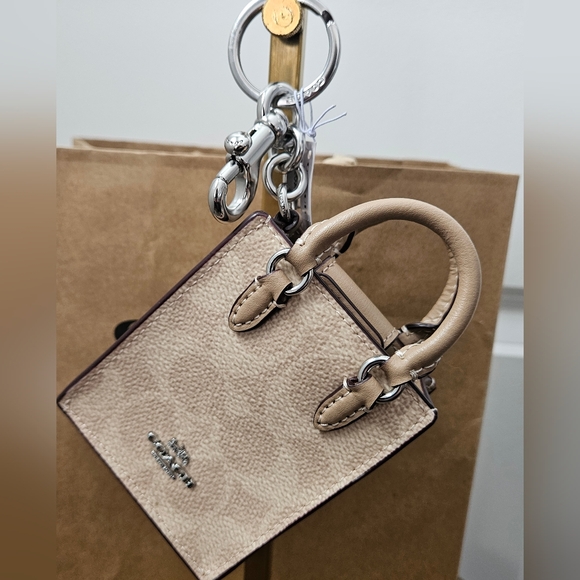 NWT COACH NORTH/SOUTH MINI TOTE BAG CHARM IN SIGNATURE CANVAS TAN & BEIGE - Picture 7 of 7